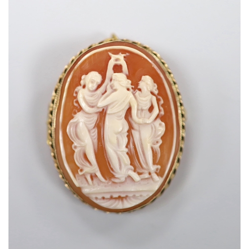 1939 - A modern 9ct gold mounted oval cameo shell pendant brooch, carved with The Three Graces, 41mm, gross... 