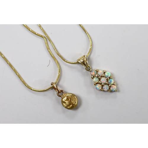 1941 - A modern 585 and white opal cluster set diamond shaped pendant, 17mm, on a 14k chain, 43cm and a yel... 