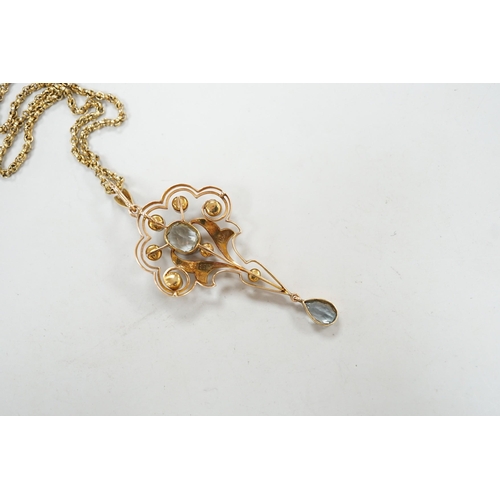 1948 - An Edwardian 15ct, aquamarine and seed pearl set drop pendant, 56mm, gross weight 5.3 grams, on a gi... 