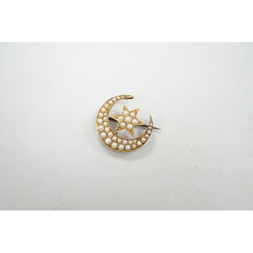 1951 - An Edwardian yellow metal and seed pearl set crescent moon and star brooch, 22mm, gross weight 4 gra... 