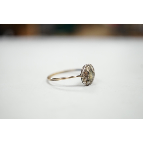 1957 - An antique yellow and white metal set rose cut diamond cluster ring, size S/T, gross weight 2.2 gram... 