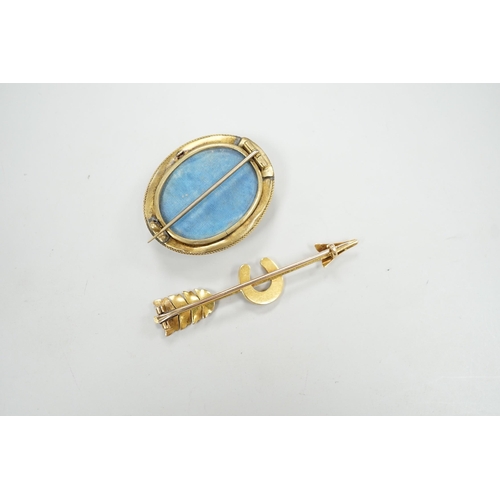 1958 - An early 20th century yellow metal, and seed pearl set arrow and horse shoe brooch, 60mm and a Victo... 