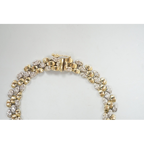 1961 - A modern two colour 585 and diamond chip set bracelet, 18cm, gross weight 17.3 grams.