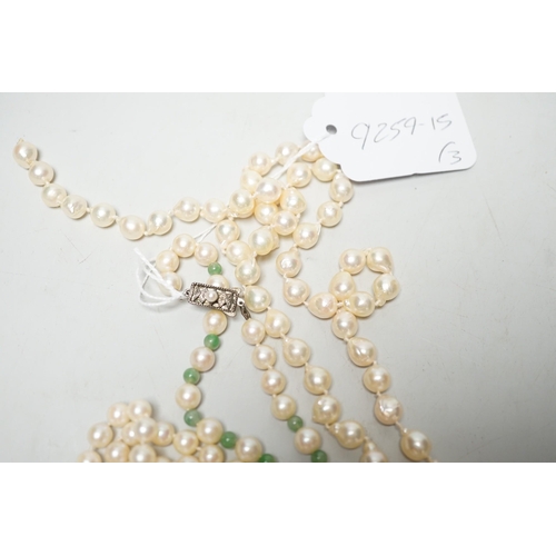 1963 - A Mikimoto single strand cultured pearl and green quartz? bead necklace, with white metal and cultur... 