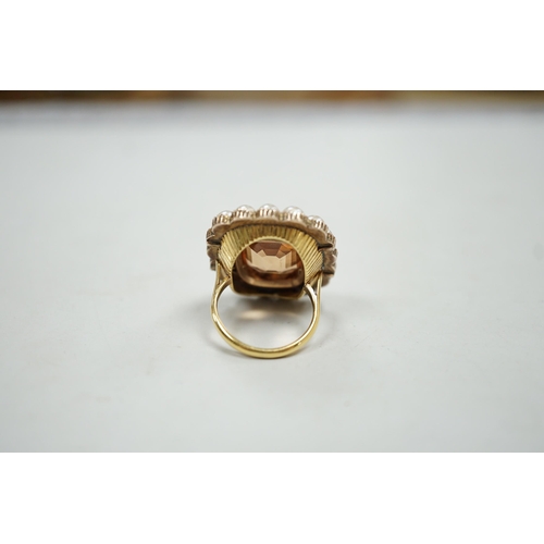 1967 - A mid 20th century gold, orange topaz and split pearl set cluster ring (adapted from an earlier broo... 