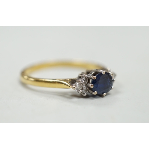 1975 - A modern 18ct gold, single stone sapphire and six stone diamond chip set ring, size O/P, gross weigh... 