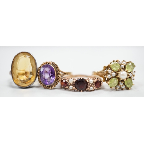 1976 - An 18ct gold and citrine set oval ring, size M/N, gross weight 5.8 grams and three assorted 9ct and ... 