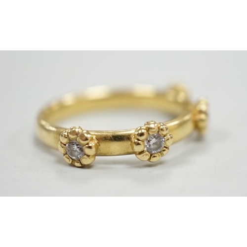 1982 - A modern 18ct gold and four stone diamond set ring, size K, gross weight 4 grams.