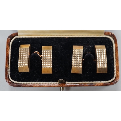 1983 - A pair of 9ct gold shaped rectangular cuff links, 19mm, 18.9 grams.