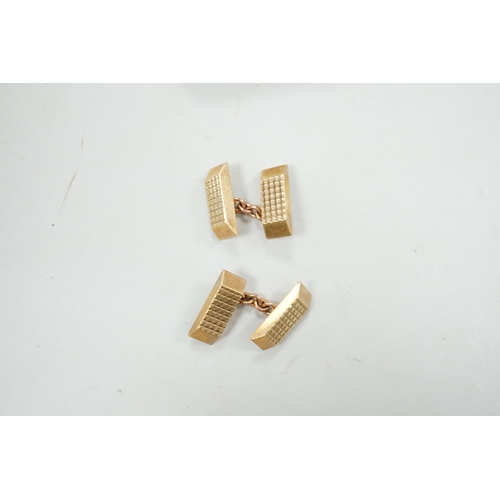 1983 - A pair of 9ct gold shaped rectangular cuff links, 19mm, 18.9 grams.