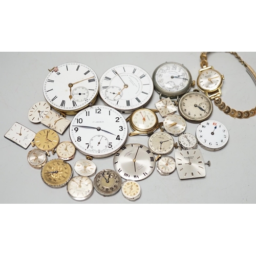 1990 - A collection of assorted wrist and pocket watch parts.