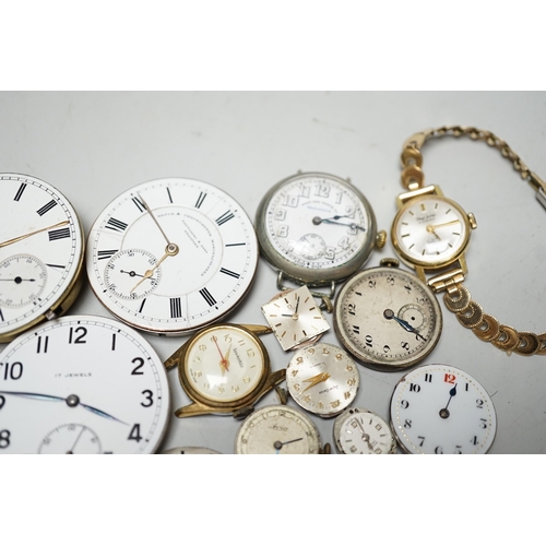 1990 - A collection of assorted wrist and pocket watch parts.