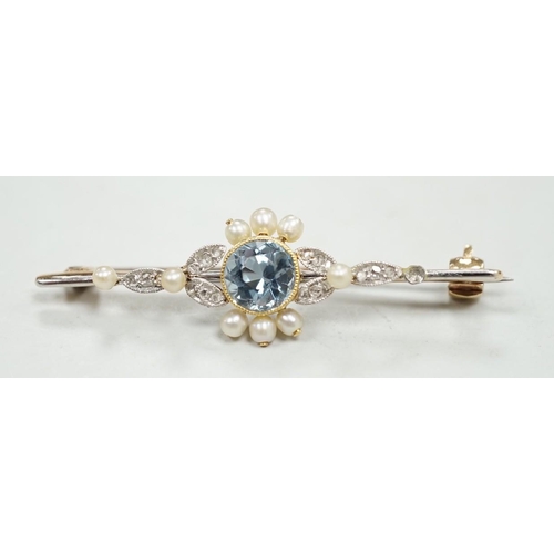 1993 - An Edwardian yellow metal, aquamarine, diamond and seed pearl set bar brooch, 40mm, gross weight 3 g... 