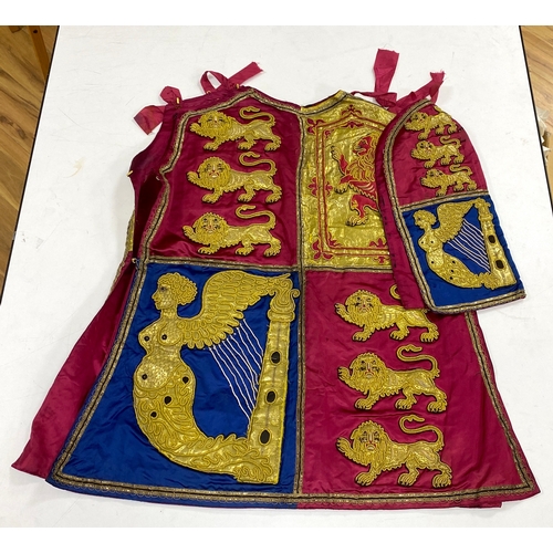 1596 - Two QEII Officer's of Arms of The Herald's College embroidered tabards and a similar silk garter, po... 