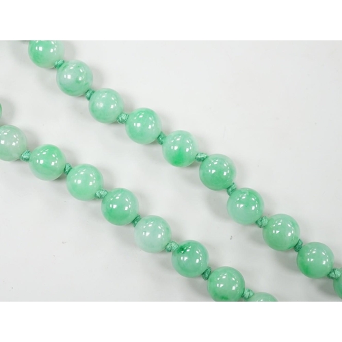 994 - A single strand jade bead necklace, 58cm, gross weight 91 grams.