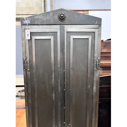 100 - An Indian style metal two door cupboard, width 60cm, depth 41cm, height 186cm *Please note the sale ... 