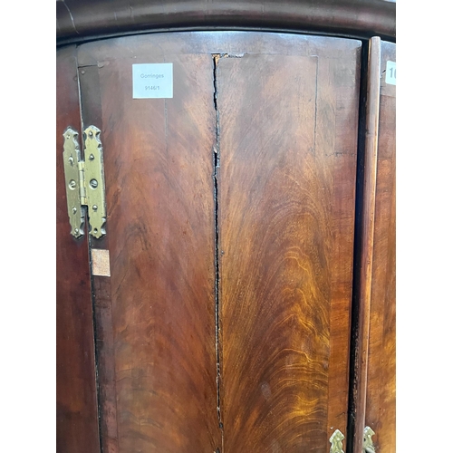 101 - A George III mahogany bowfront corner cabinet on stand, width 72cm, depth 50cm, height 167cm *Please... 