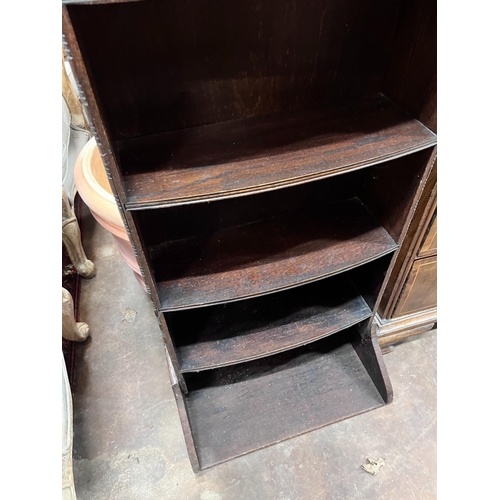 102 - A 1920's oak narrow eight shelf open bookcase, width 49cm, depth 30cm, height 161cm *Please note the... 