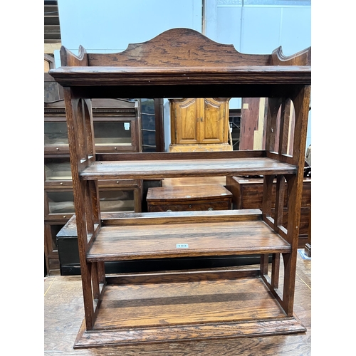 103 - An Edwardian oak table top four tier open bookcase, width 62cm, depth 23cm, height 81cm *Please note... 