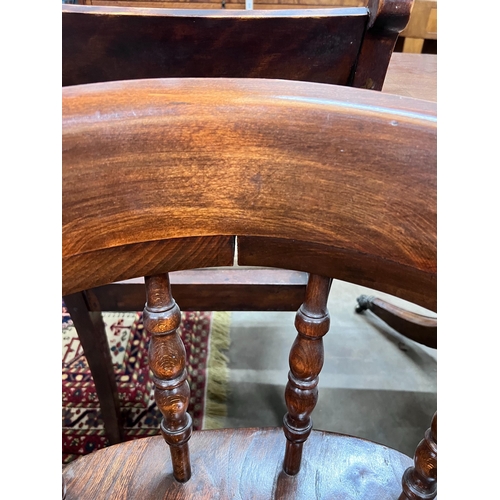 111 - A Victorian style elm and beech smoker's bow chair, width 69cm, depth 50cm, height 82cm *Please note... 