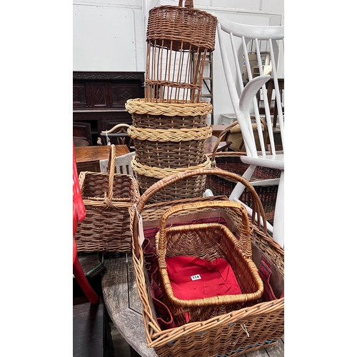 114 - An Asprey horse grooming basket, three waste paper baskets, three picnic baskets and a picnic drinks... 