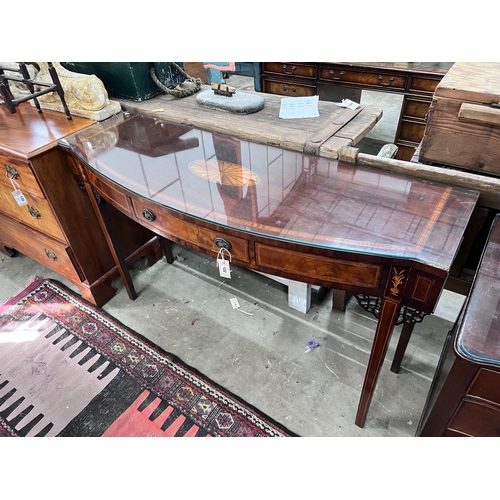 122 - A George III inlaid mahogany bow front serving table, length 140cm, depth 47cm, height 84cm *Please ... 