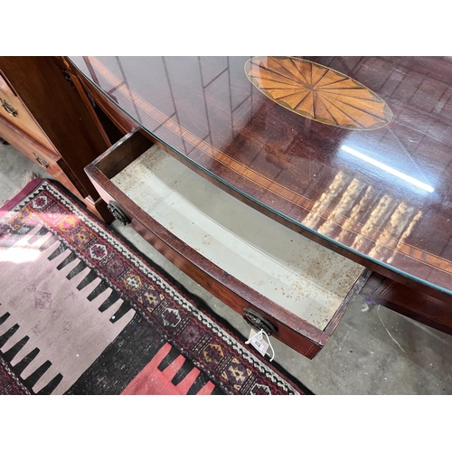 122 - A George III inlaid mahogany bow front serving table, length 140cm, depth 47cm, height 84cm *Please ... 