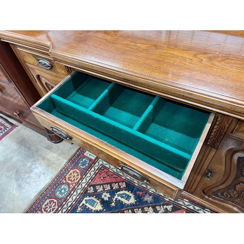 129 - A late Victorian carved walnut breakfront sideboard, length 153cm, depth 52cm, height 107cm *Please ... 