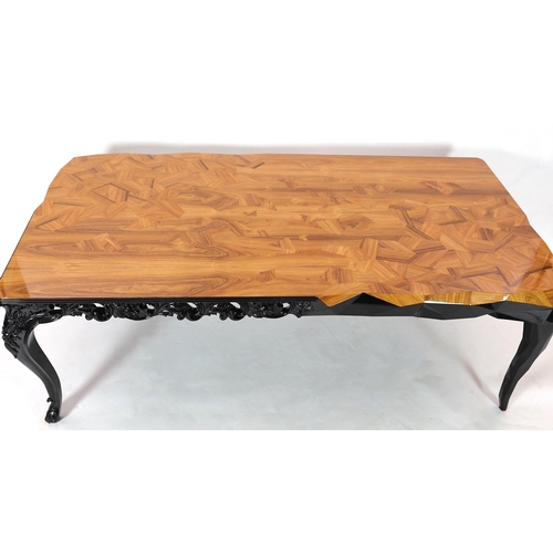 137 - A contemporary Boca Do Lobo palissandre and black lacquer 'Royal' dining table, with parquetry venee... 