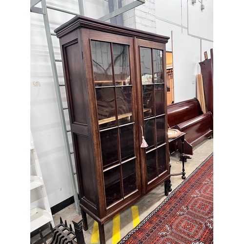 14 - A George III mahogany glazed two door bookcase, width 112cm, depth 38cm, height 188cm*Please note th... 