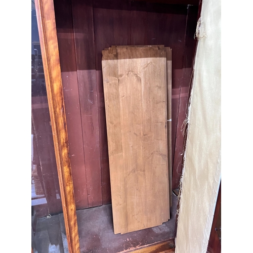 140 - A Victorian satin birch wardrobe with bevelled glass front, length 124cm, depth 51cm, height 222cm *... 