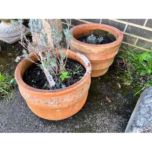 157 - Two circular terracotta planters, larger height 30cm *Please note the sale commences at 9am.