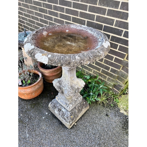 158 - A circular reconstituted stone bird bath, diameter 65cm, height 94cm *Please note the sale commences... 