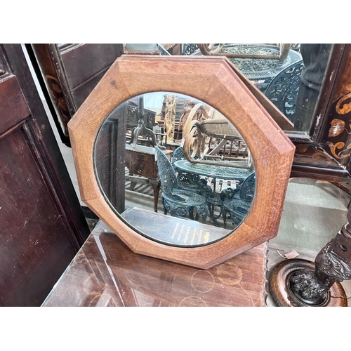 16 - A 1920's mahogany side table, width 45cm, height 70cm, together with an octagonal oak framed wall mi... 