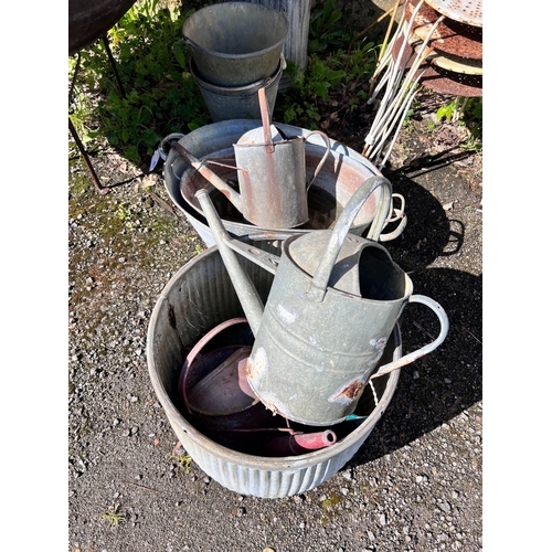 161 - Ten assorted galvanised containers, watering cans, etc. *Please note the sale commences at 9am.... 