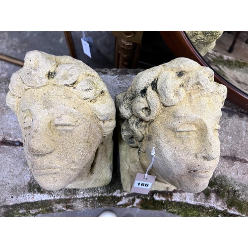 166 - A pair of reconstituted stone corbels, height 22cm *Please note the sale commences at 9am.