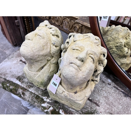 166 - A pair of reconstituted stone corbels, height 22cm *Please note the sale commences at 9am.