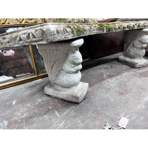 169 - A reconstituted stone curved garden bench, width 160cm, height 46cm *Please note the sale commences ... 