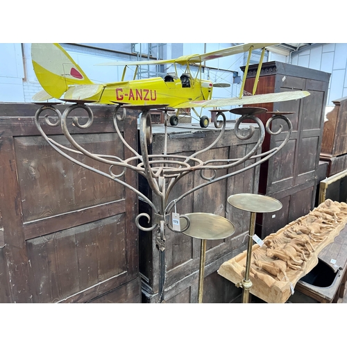 173 - A wrought iron candelabrum lamp standard, height 187cm *Please note the sale commences at 9am.... 