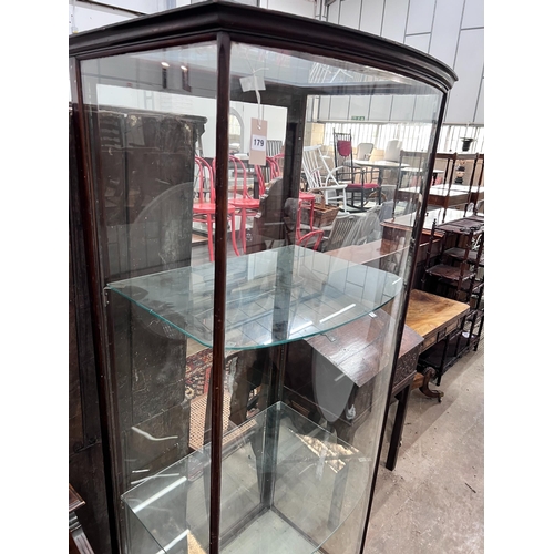 179 - A late Victorian mahogany bowfront shop display cabinet, width 84cm, depth 58cm, height 196cm *Pleas... 