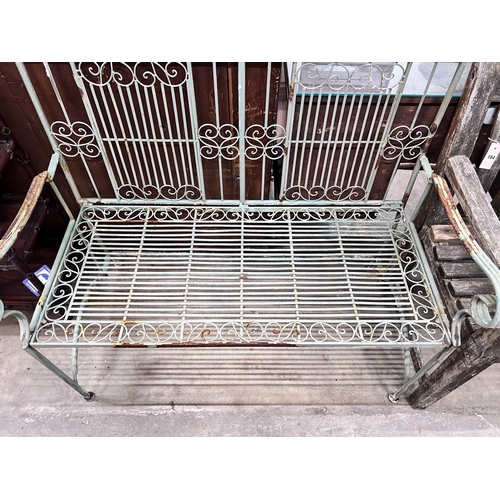 183 - A painted wrought iron folding garden bench, width 108cm *Please note the sale commences at 9am.... 