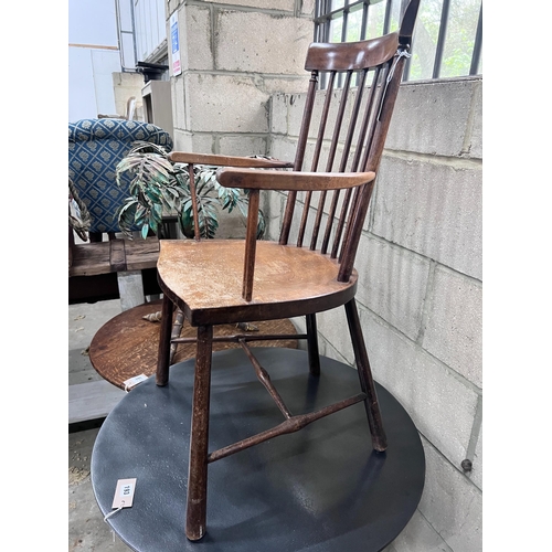 192 - An Arts & Crafts beech Windsor comb back elbow chair, width 49cm, depth 41cm, height 86cm *Please no... 