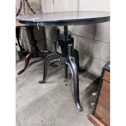 193 - A cast iron and painted metal adjustable circular occasional table, width 75cm *Please note the sale... 