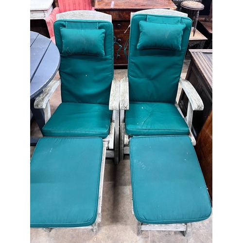 201 - A pair of Indian Ocean weathered teak Burnham steamer chairs with green fabric squab cushions *Pleas... 