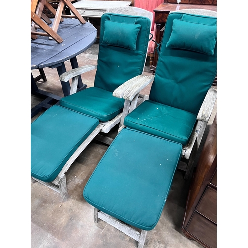 201 - A pair of Indian Ocean weathered teak Burnham steamer chairs with green fabric squab cushions *Pleas... 