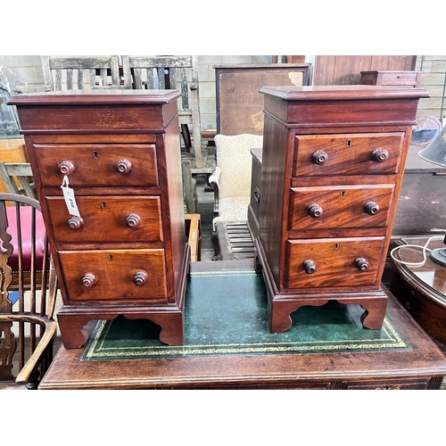 210 - A pair of mahogany bedside chests (converted from desk pedestals), width 34cm, depth 39cm, height 67... 