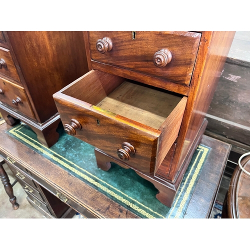 210 - A pair of mahogany bedside chests (converted from desk pedestals), width 34cm, depth 39cm, height 67... 