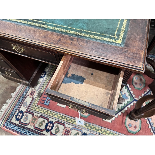 211 - An Edwardian walnut pedestal desk, width 107cm *Please note the sale commences at 9am.