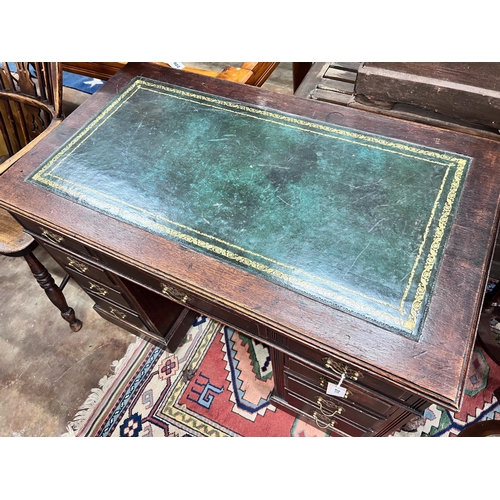 211 - An Edwardian walnut pedestal desk, width 107cm *Please note the sale commences at 9am.