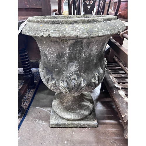 223 - A reconstituted stone garden urn, height 70cm *Please note the sale commences at 9am.